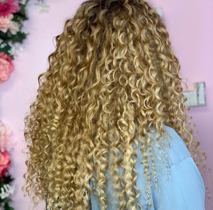 Sambi Ash blonde curly clip-in hair extensions made from 100% Remy human hair